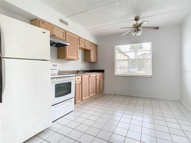 kitchen featuring white appliances, light brown cabinets, sink, ceiling fan, and light tile patterned floors