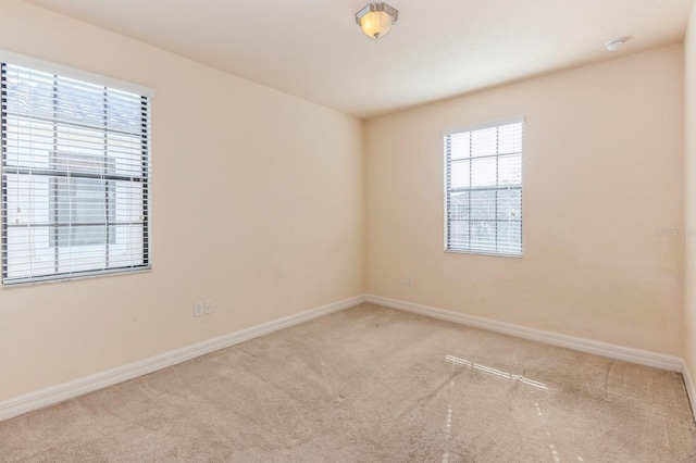 view of carpeted spare room