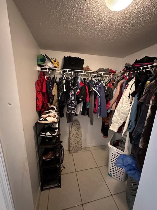 walk in closet featuring tile patterned floors