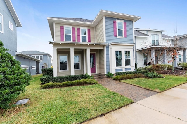 view of front of property featuring a front yard