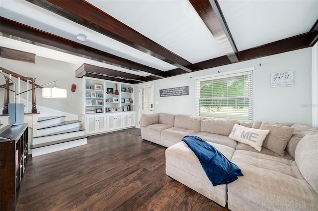 living room featuring dark hardwood / wood-style flooring, built in features, and beamed ceiling