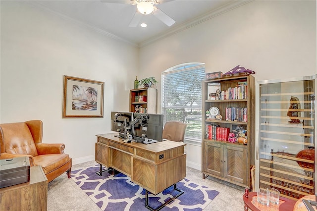 office area with light carpet, ceiling fan, and ornamental molding