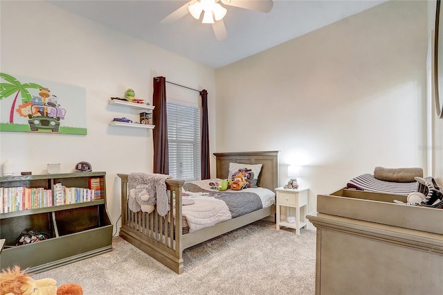 bedroom with ceiling fan and light colored carpet