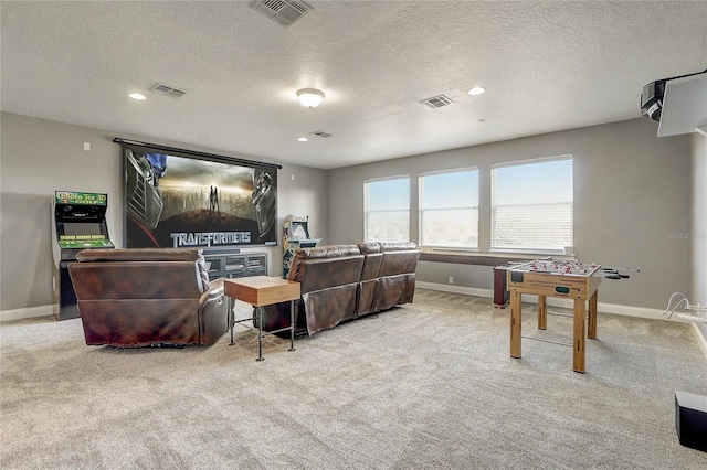 living room with a textured ceiling and light colored carpet