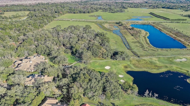 aerial view with a rural view and a water view