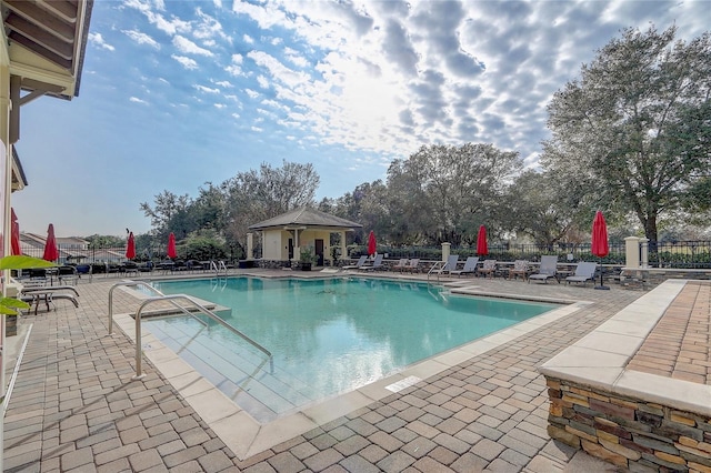 view of swimming pool featuring a patio