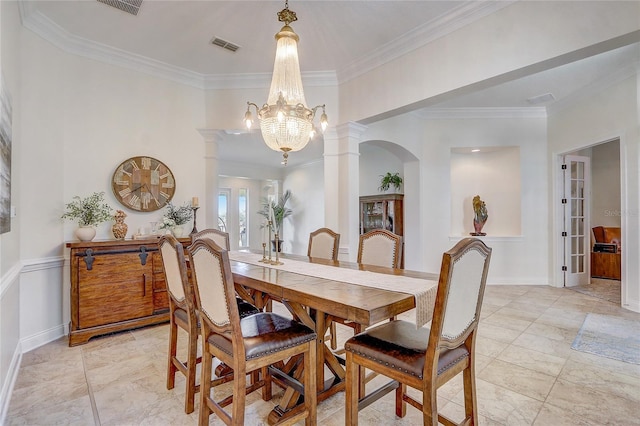 32604 View Haven Ln, Sorrento, FL 32776 - dining room with decorative columns, ornamental molding, a chandelier, and arched walkways