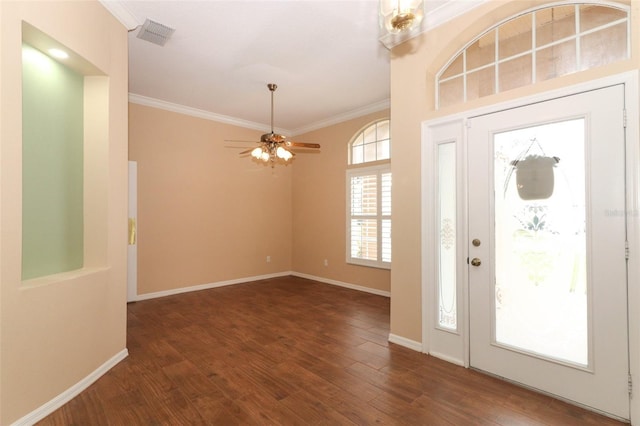 foyer entrance featuring ceiling fan, ornamental molding, and dark hardwood / wood-style floors