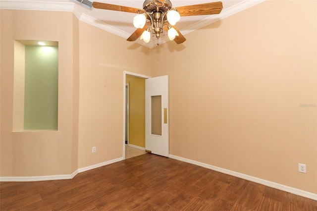 spare room with ceiling fan, ornamental molding, and hardwood / wood-style floors