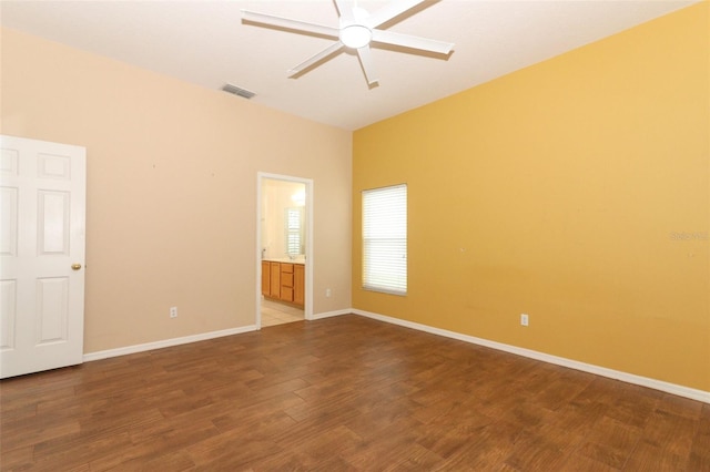 unfurnished room with ceiling fan and wood-type flooring