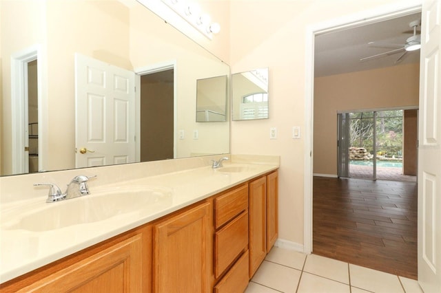 bathroom with vanity, tile patterned flooring, and ceiling fan