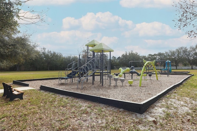 view of playground featuring a lawn