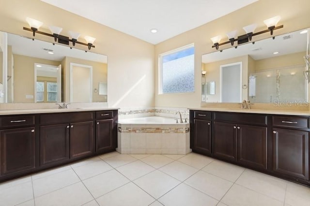 bathroom with vanity, separate shower and tub, and tile patterned flooring