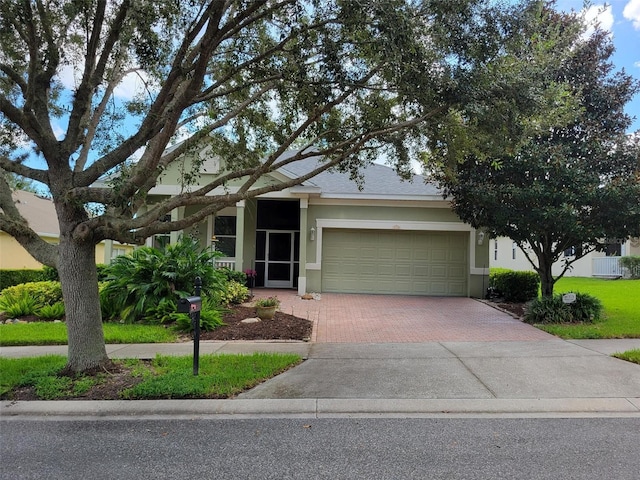 view of front of property featuring a garage