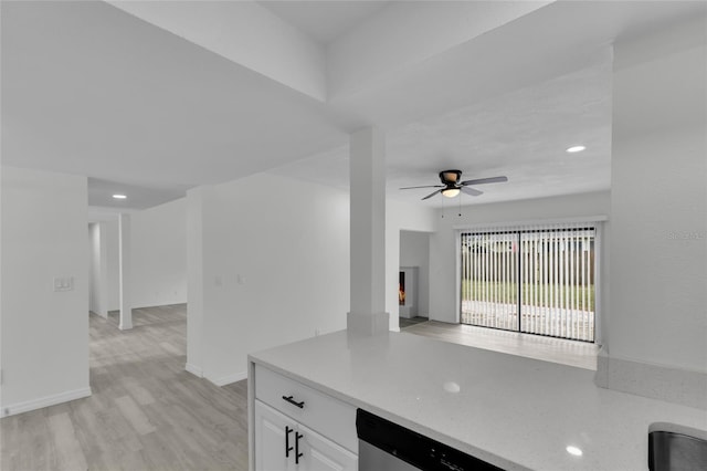 kitchen featuring ceiling fan, white cabinets, dishwasher, and light hardwood / wood-style floors