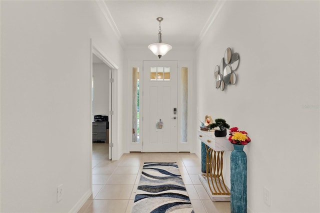 entryway featuring ornamental molding and light tile patterned floors