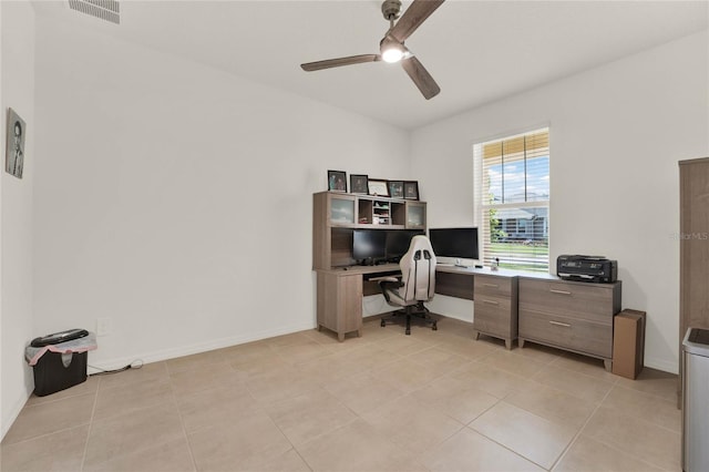 office featuring ceiling fan and light tile patterned floors