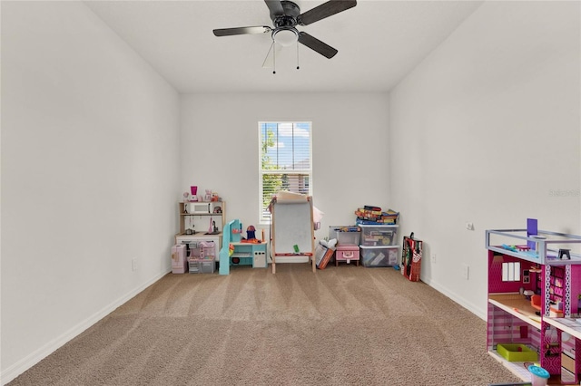 playroom featuring carpet flooring and ceiling fan