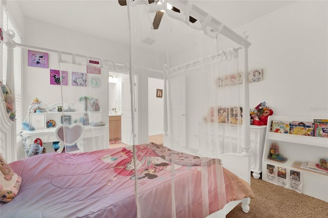 bedroom with ceiling fan and carpet flooring