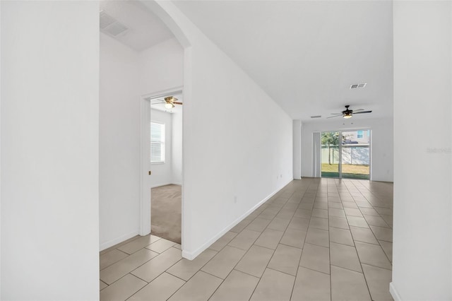 hallway with light tile patterned flooring