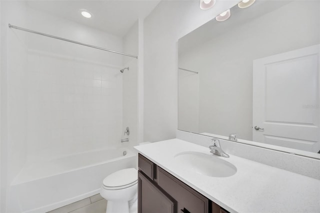 full bathroom featuring tile patterned flooring,  shower combination, vanity, and toilet