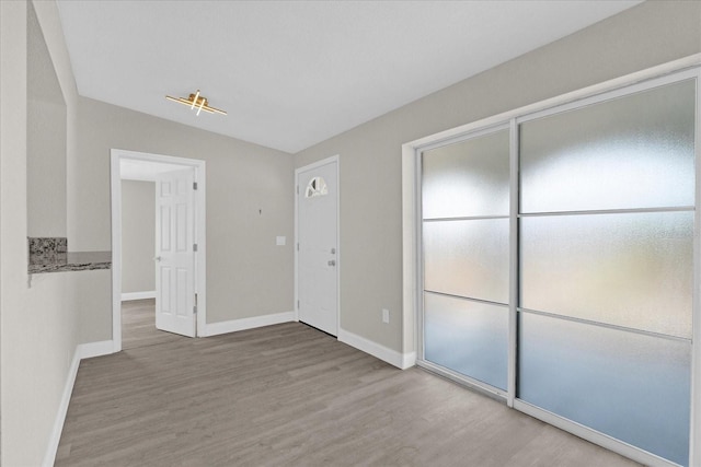 unfurnished bedroom featuring hardwood / wood-style floors