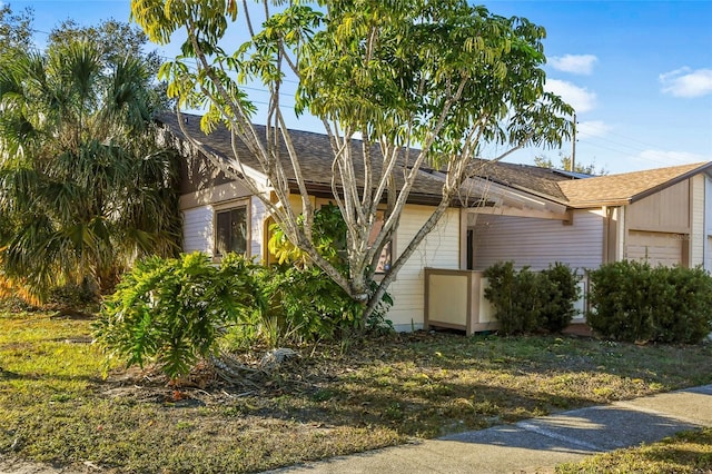 view of property exterior with a garage