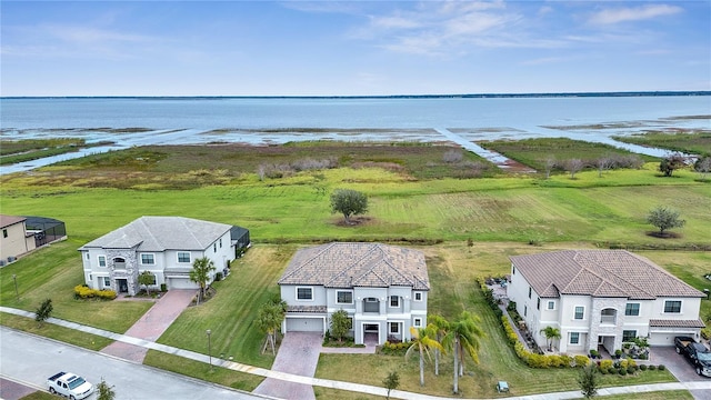 birds eye view of property featuring a water view