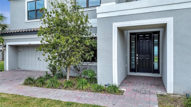 entrance to property with a garage