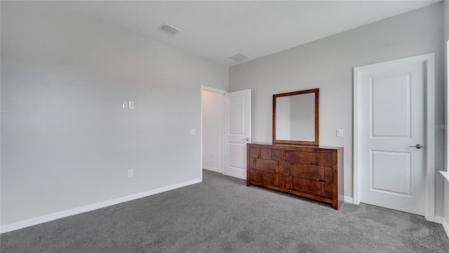 unfurnished bedroom with carpet floors