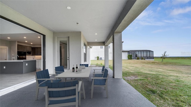 view of patio / terrace with sink