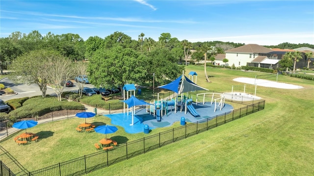 view of playground featuring a lawn