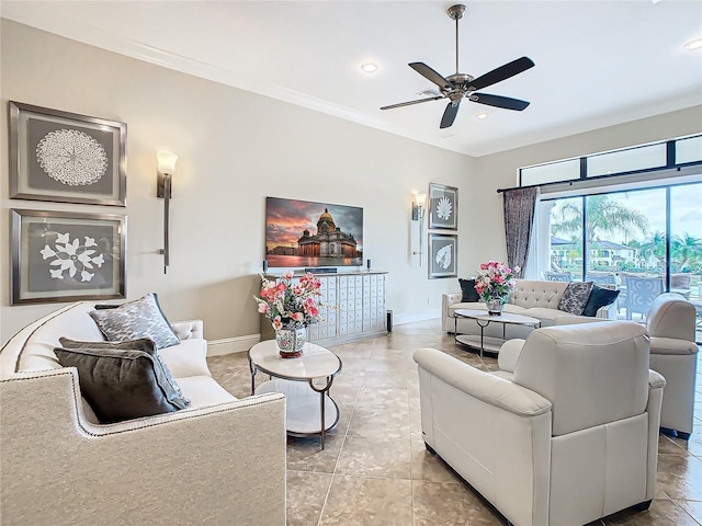 tiled living room featuring ceiling fan and ornamental molding