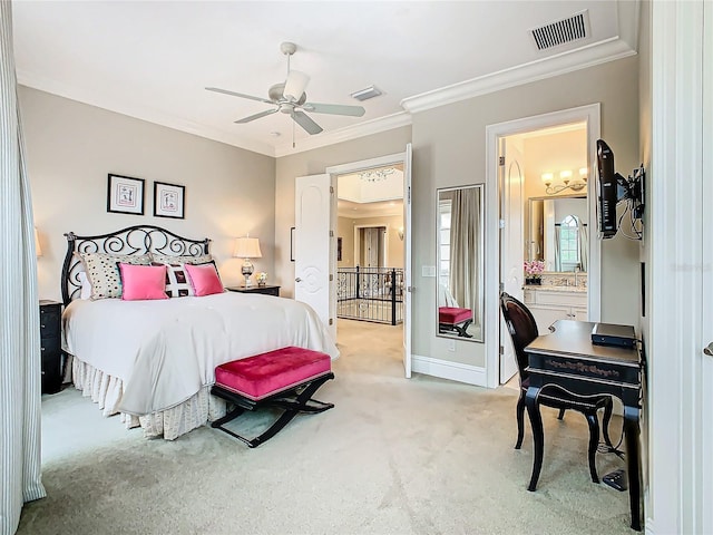 bedroom with ensuite bath, ceiling fan, ornamental molding, and light colored carpet