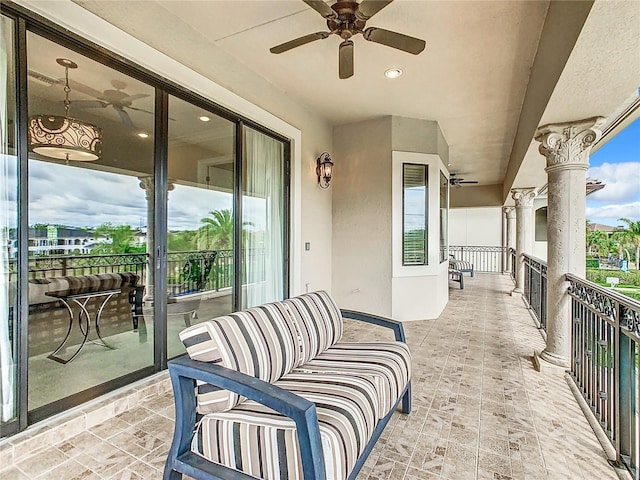 balcony featuring ceiling fan