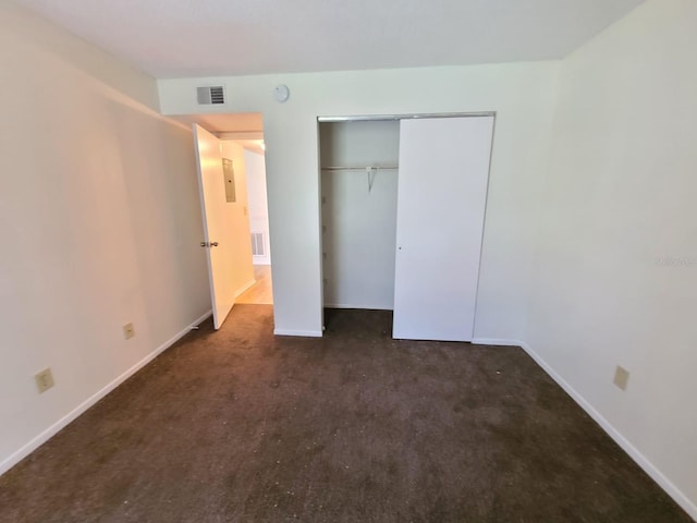 unfurnished bedroom with a closet