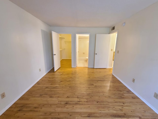 empty room featuring light hardwood / wood-style flooring