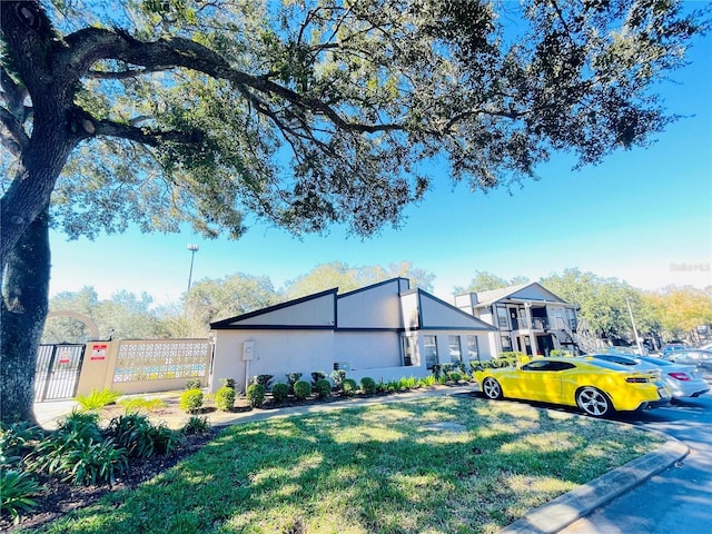 view of home's exterior with a yard