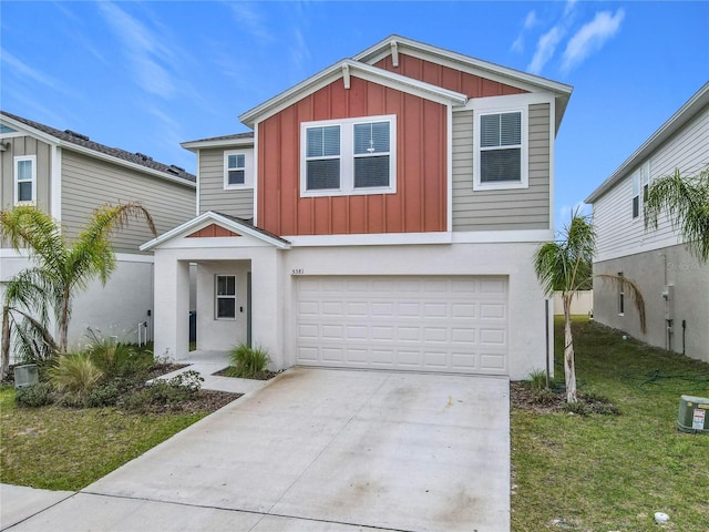 view of front of home featuring a garage and a front lawn