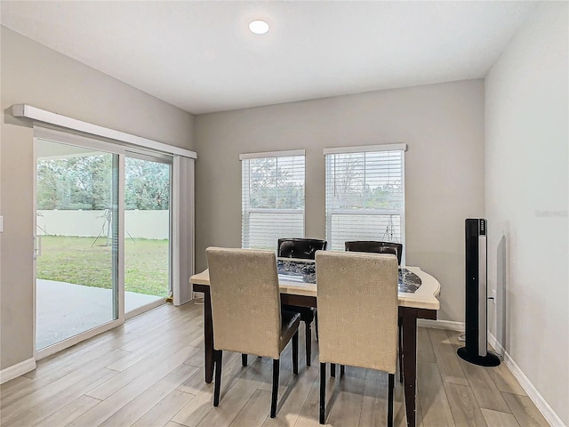 dining room featuring light hardwood / wood-style flooring