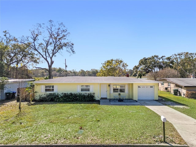 single story home with a garage and a front yard