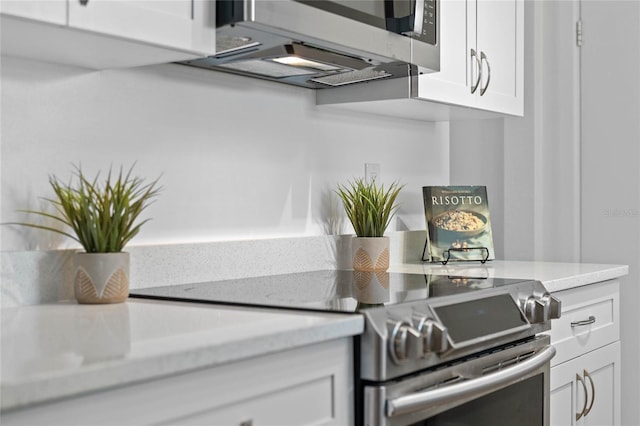 kitchen with white cabinetry