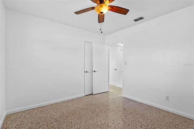 empty room with ceiling fan