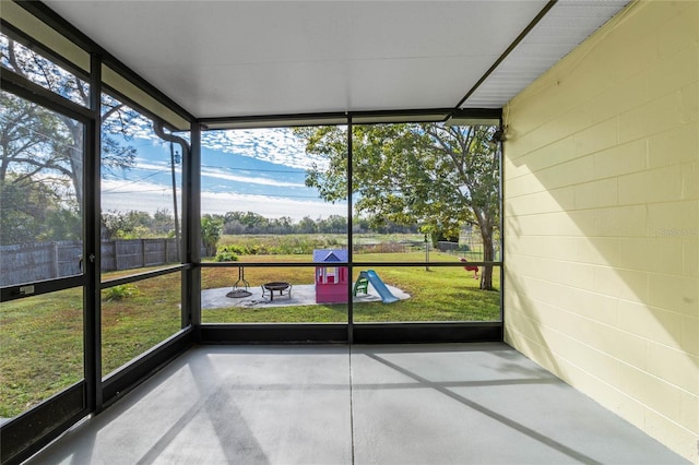 unfurnished sunroom with a wealth of natural light