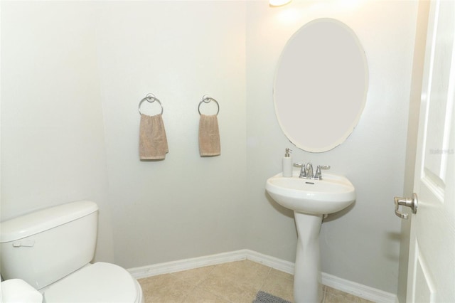 bathroom featuring sink and toilet