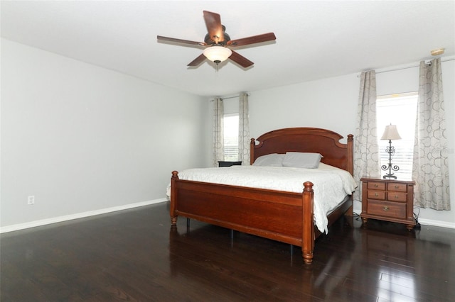 bedroom featuring ceiling fan and dark wood-type flooring