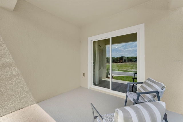 view of patio with a balcony