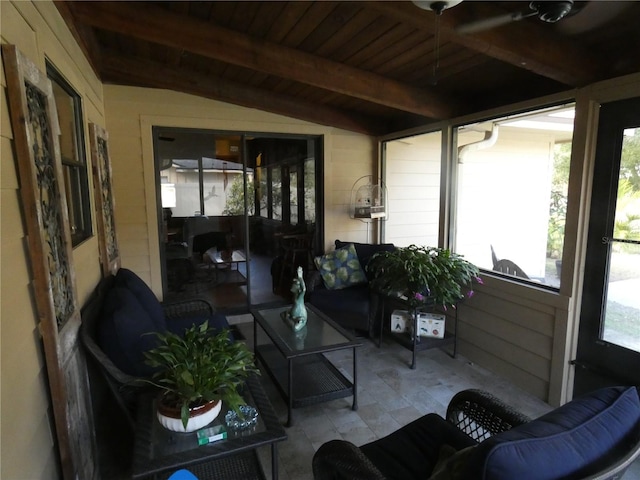 sunroom / solarium featuring wooden ceiling and vaulted ceiling with beams