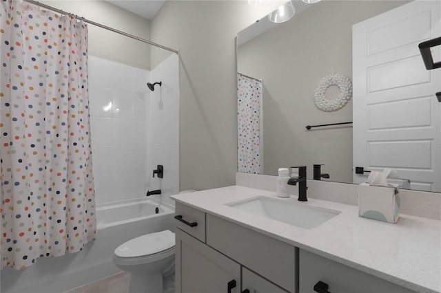 full bathroom with shower / tub combo with curtain, vanity, and toilet