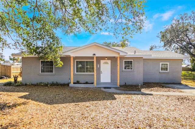 ranch-style home with a porch